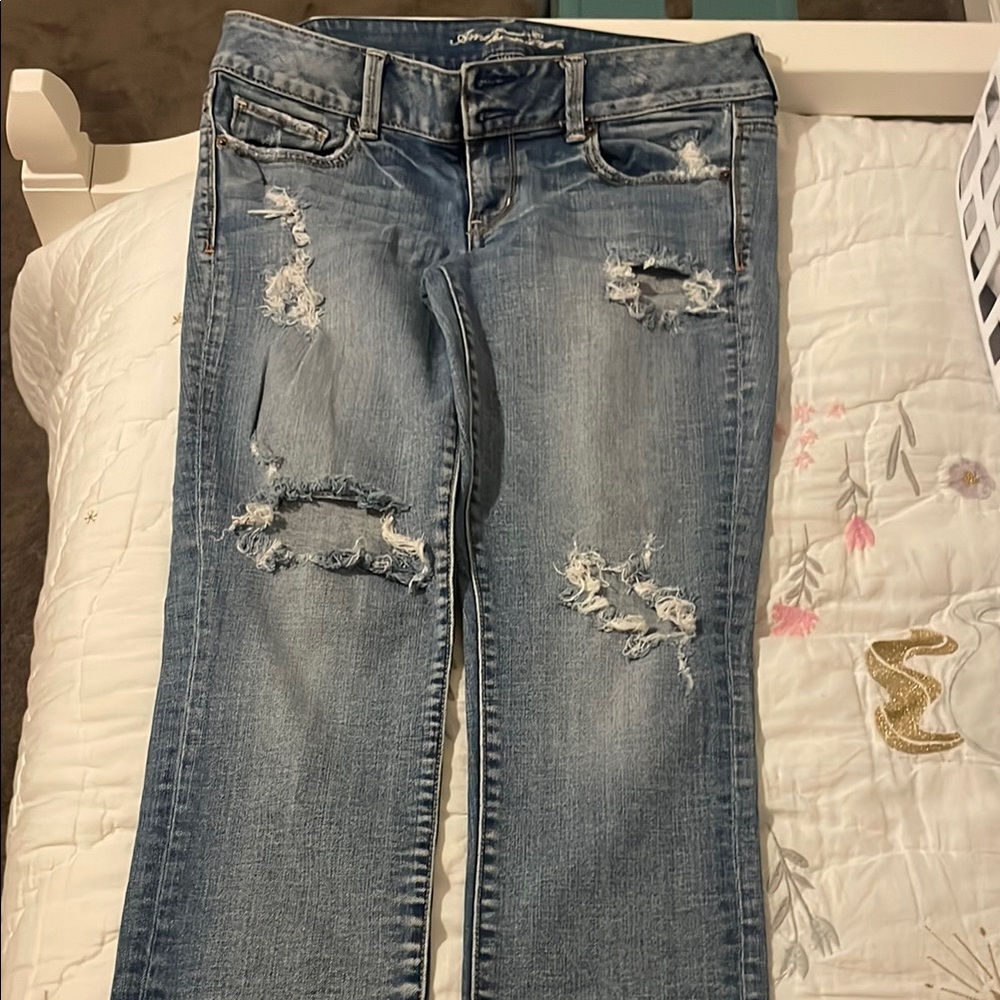Distressed (“Artist”) Blue Jeans by American Eagle size 8